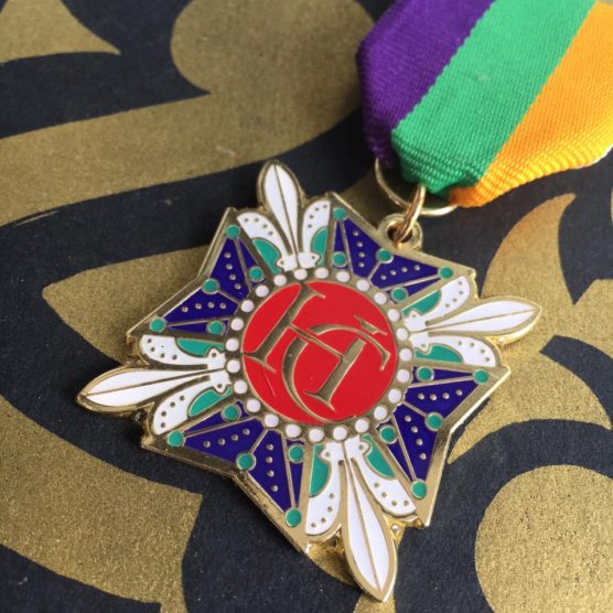 A close up of the medal on a table