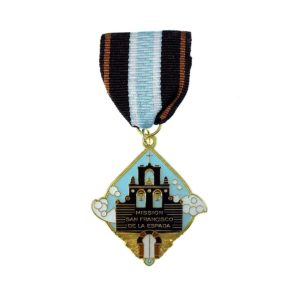 A medal with a castle on it