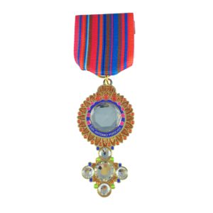 A medal with a cross on it.