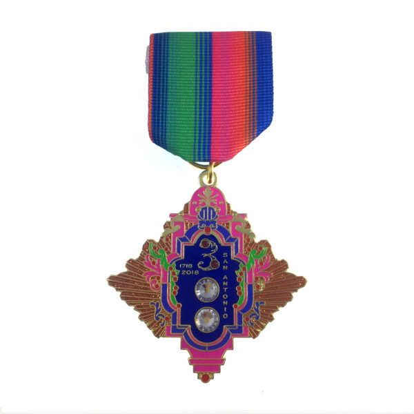 A medal with a colorful ribbon hanging from it.